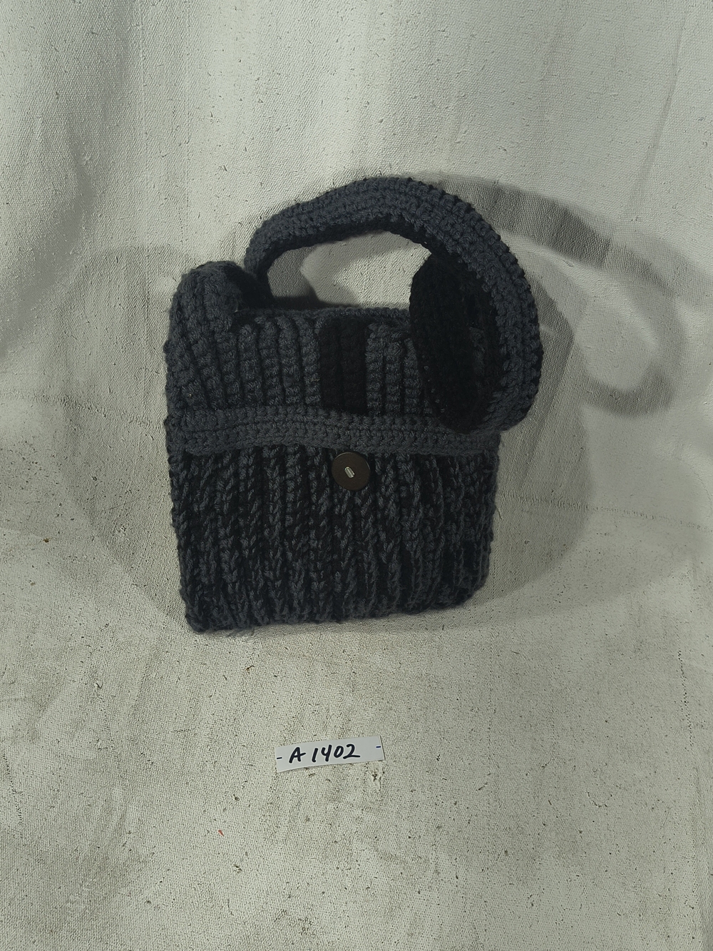 Handcrafted Black Knit Shoulder Bag with Button Accent